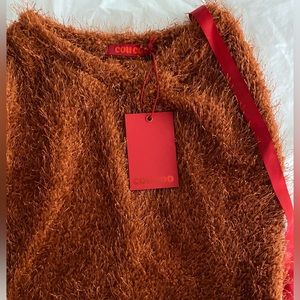 Coucoo Kaibu mini skirt in small. Never worn. New with tag